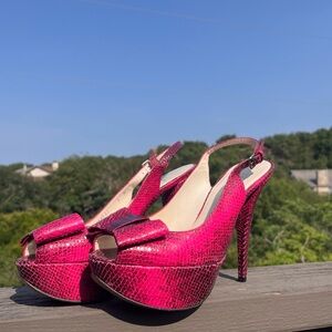 Stuart Weitzman bow leather snake pumps